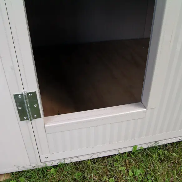Entrée du chien dans le chenil modèle Modular